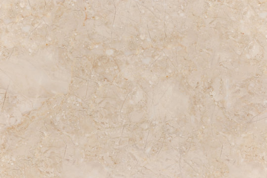 Cream marble background, natural stone texture.