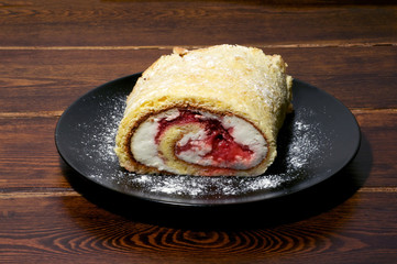 Rolled pie on the plate