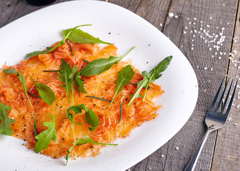 Salmon carpaccio close up