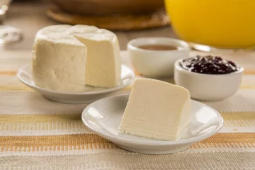 Fototapeten Brazilian sheep cheese. Fruits and different types of cheese in © paulovilela