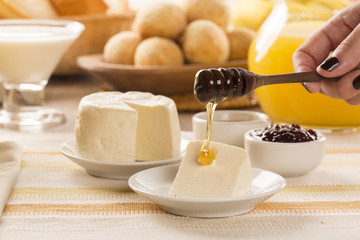 Brazilian sheep cheese. Fruits and different types of cheese in