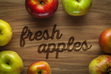 Apples on wooden background