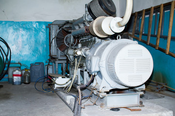 Old electrical standby diesel generator providing emergent power service