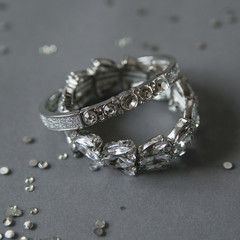 Jewelry diamond ring on the grey background.