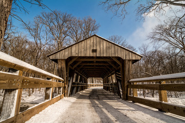 Fototapeta na wymiar Snowy Covered Bridge Trail