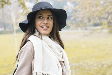 Pretty young woman with hat
