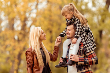Naklejka premium Family walk autumn