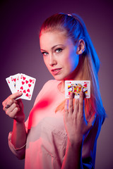 woman playing poker having flash royale in her hands