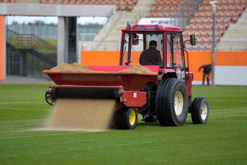 Sandblasting of football field