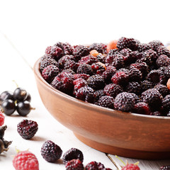 Ceramic bowl with organic blackberries