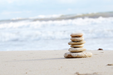 Stack of pebbles at the sea coast