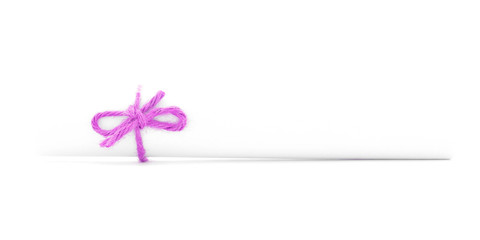 White message scroll tied with rope, left pink knot isolated