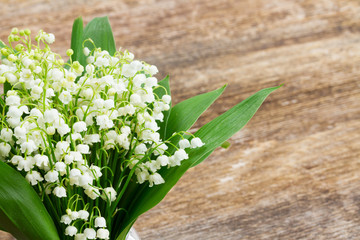Lilly of valley on wood 