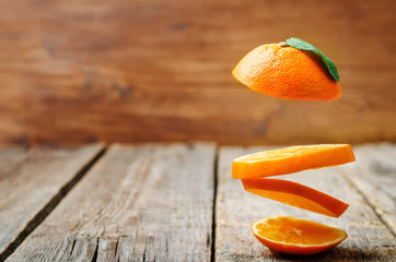 flying slices of orange
