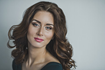 Naklejka premium A charming girl with makeup and hairstyle 4959.