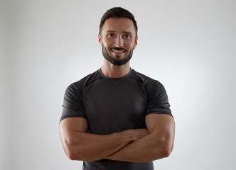 Fototapeta premium Cheerful man looking at camera