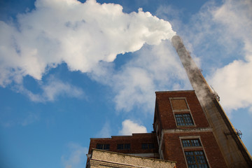 Smoke of thermal station. Frosty (cold) day