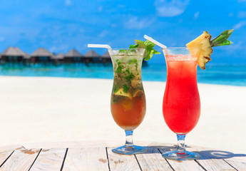 cocktail with blur beach on background