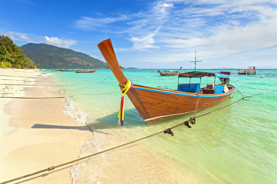 Long tail boat at a beautiful beach, Thailand.