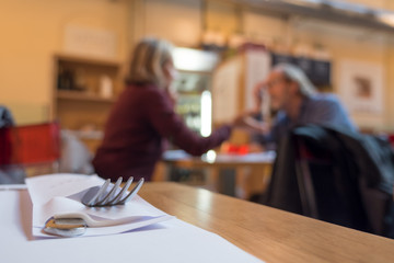 Obraz na płótnie Canvas Silverware on a dining table in a restaurant