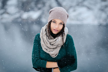 Beautiful young woman in wintertime outdoor