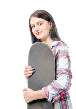  smiling skater girl holding skateboard on white