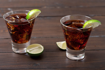 cocktails rum and cola cuba libre with Lime and Ice