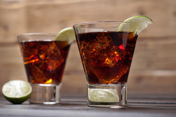 Rum and cola cuba libre with Lime and Ice