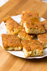 Served pie with cheese cucumber and ham