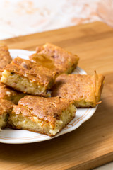 Served pie with cheese cucumber and ham