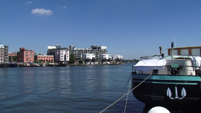AMSTERDAM -  pan KNSM Island, located in the Eastern Docklands of Amsterdam, today a large residential area.