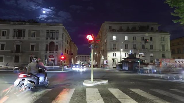 Nighttime time-lapse of a busy street in Rome.