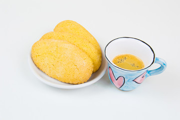 Colorful coffee cup with hand draw of love heart on wood board