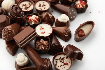 Assorted chocolate candies, close up