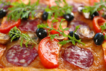 Background of delicious pizza, close-up