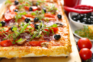 Rectangle delicious pizza on the table, close-up
