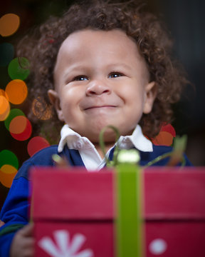 Toddler Holding Gift