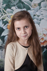 Naklejka premium 8 year old girl portrait in studio