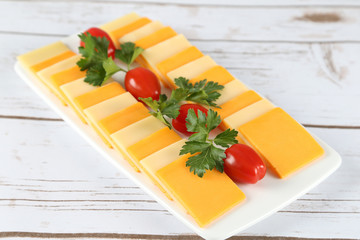 Various types of cheese on a plate