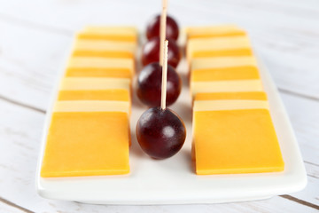 Various types of cheese on a plate