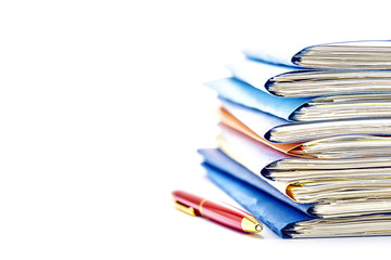 Stacked files. On white background with copy space on the left side.