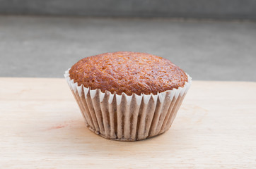 Banana muffin cake on wooden board