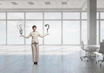 Fototapeta premium Businesswoman in top floor office