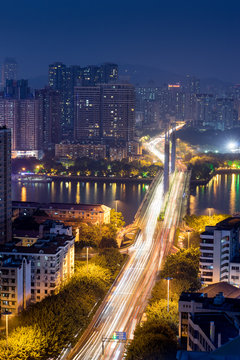 Guangzhou, China-Jan. 7, 2015: City night view. Busy traffic sce © victor217