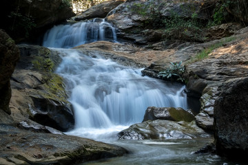 Obraz na płótnie Canvas creek flowing over the rocks