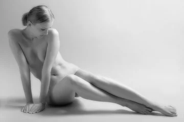 Fotobehang Beautiful sitting nude woman. Film grain. © aleks-p