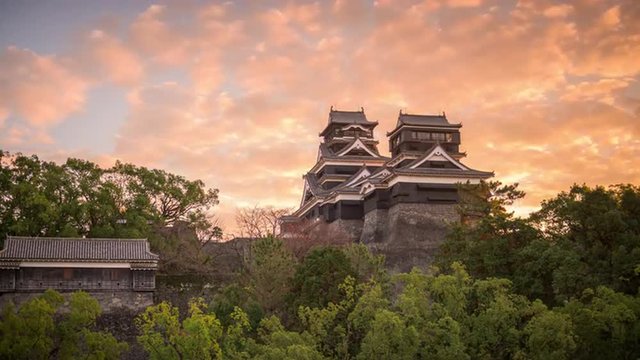 Kumamoto Castle in Kumamoto, Japan at dusk.