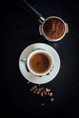 cup of coffee latte art in coffee shop vintage color tone