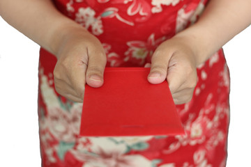 The hands Give Red gift money on Chinese New Year on white background