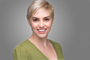 Young attractive edgy fashionable modern look young refreshing headshot short pixie hair perfect...